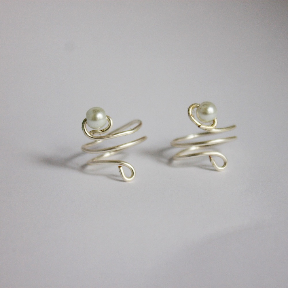 Two 3-wire wrap rings with white glass pearl